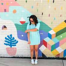 Load image into Gallery viewer, Two bottles of nail polish, one with a blue liquid and the other with a clear liquid, both labeled 'CAPE COD NAIL CO'.